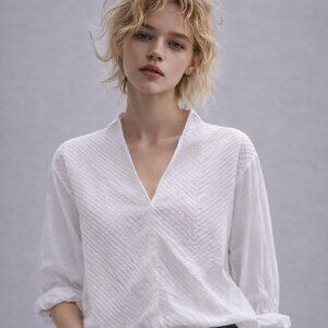 Oversized Vintage blouse with pleated detail on front panels, unusual neckline
